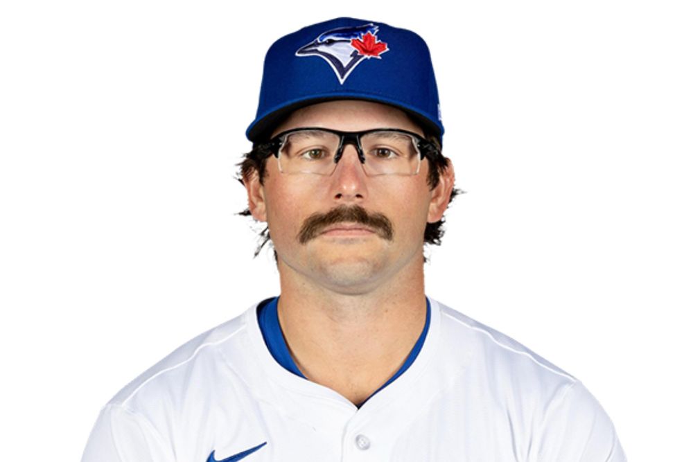 davis schneider complete with 70s baseball stache and athletic glasses