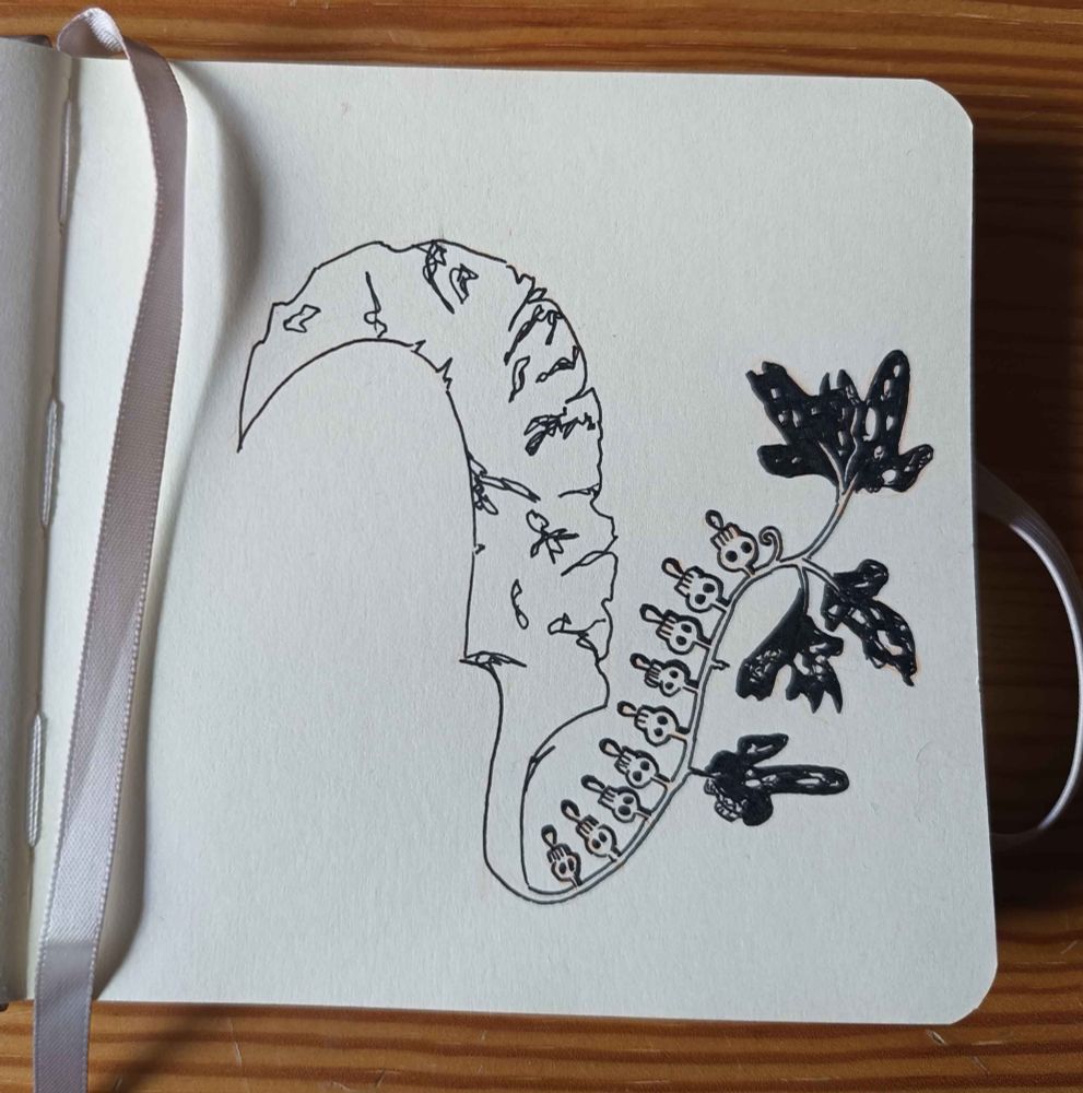 Another sword with skulls instead of flowers.