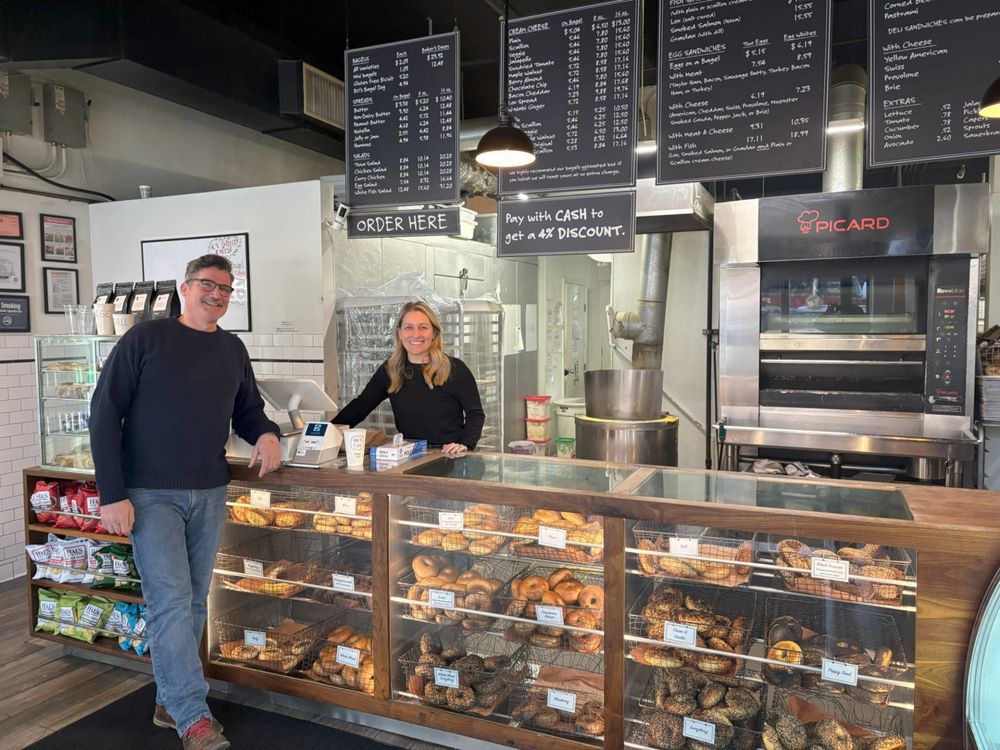 Ashley Dikos behind the counter at BO's Bagels in Harlem.
