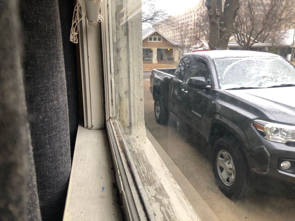 very lightly snowing