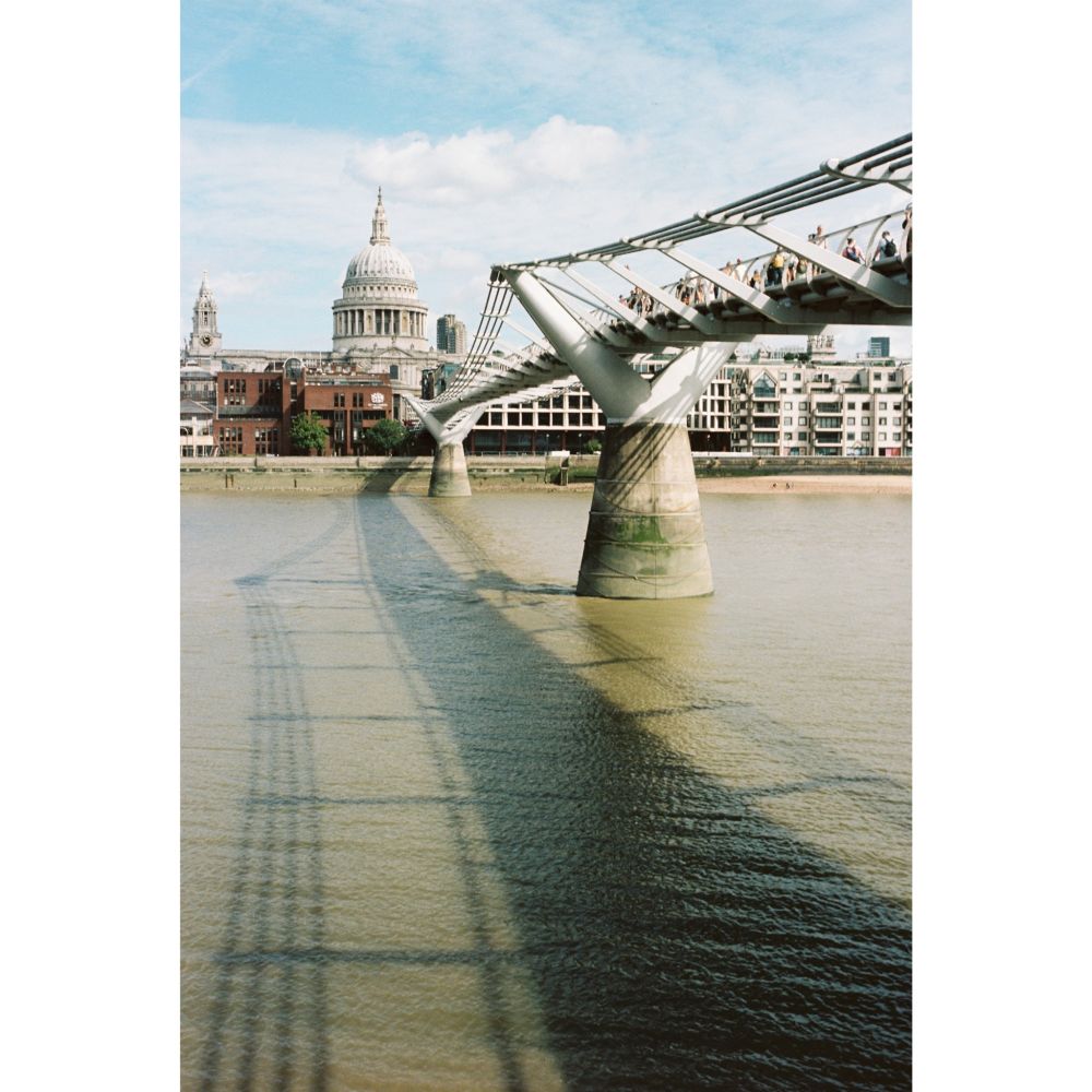 The Millennium Bridge and St Paul's Cathedral in the background on a hot August day.

Rollei 35T, Kodak Portra 160