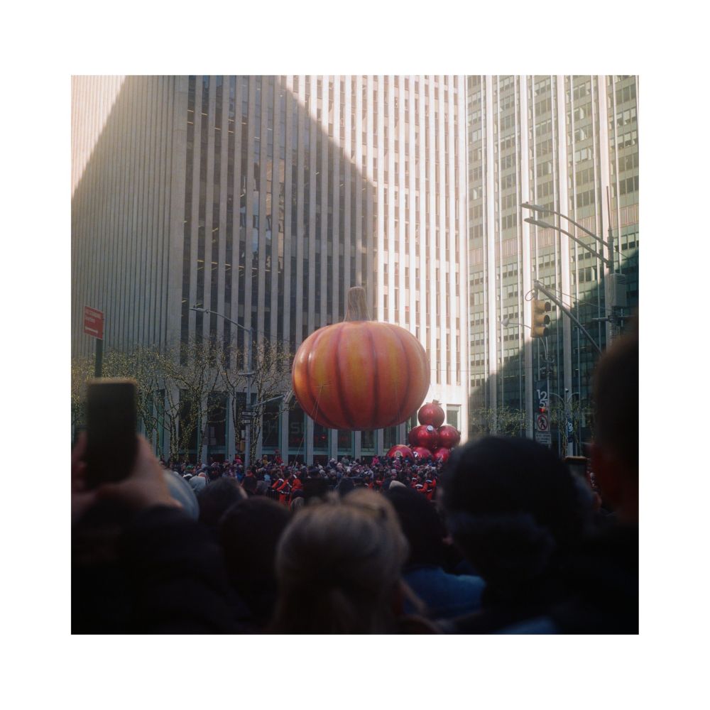 A giant inflatable pumpkin heading down Fifth Avenue on Thanksgiving Parade in NYC, 2019.

Yashica Mat 124
Kodak Portra 800