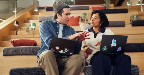 Developers working together in an open space.
