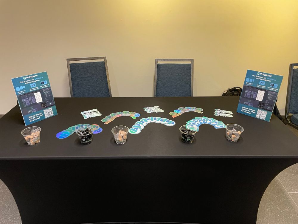 A table filled with Polypane stickers and licorice