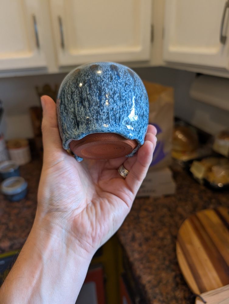 blue glaze on dundee red stoneware cup with interesting drip pattern at the foot, reproducible on several firings.