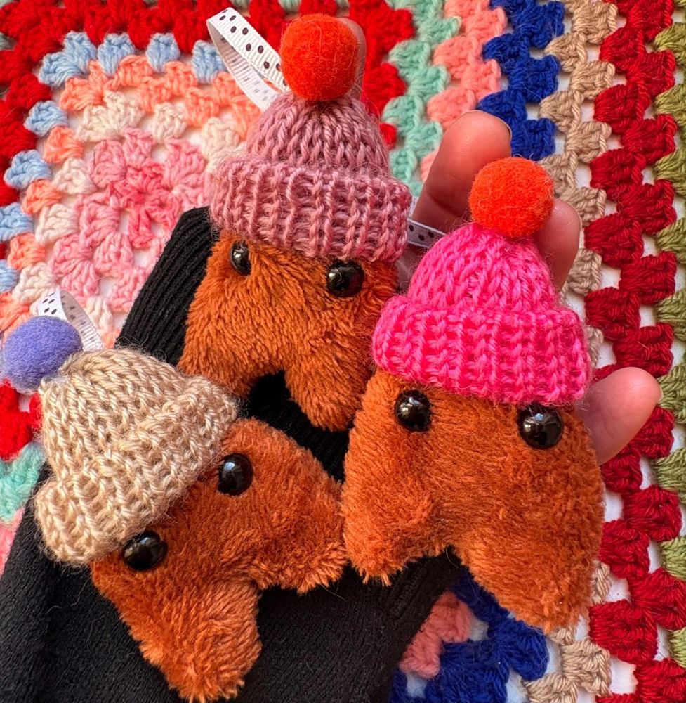 Little brown creatures in bobble hats