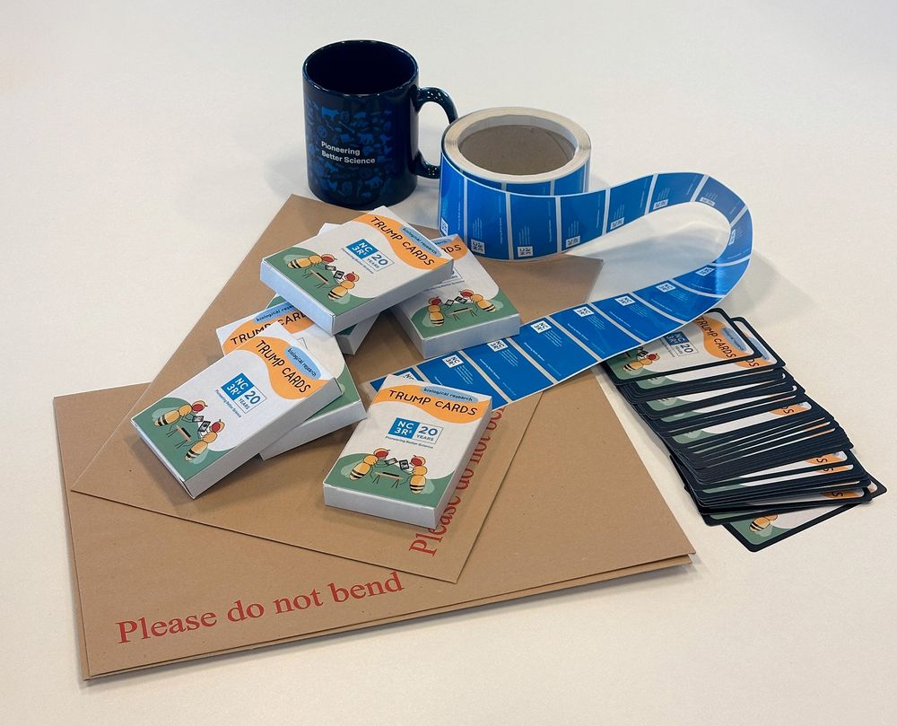 Packs of biological models trump cards ready to be posted, alongside envelopes and NC3Rs stickers.