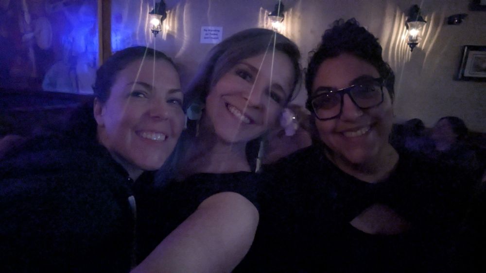 Three girls taking a selfie at Karaoke 