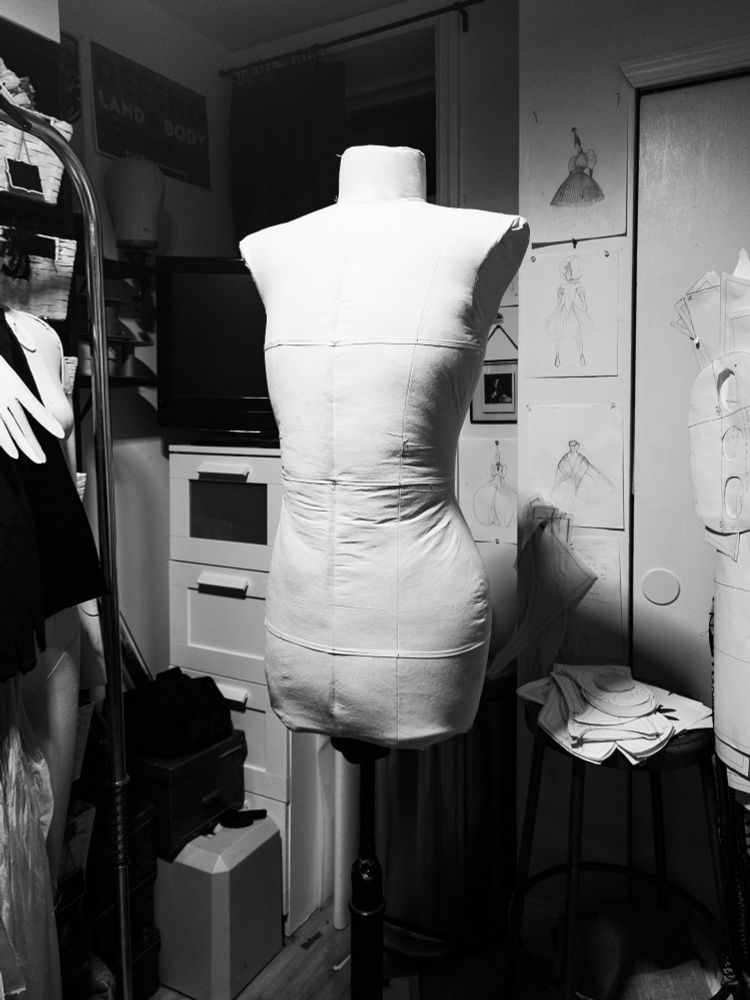 Photo of newly completed custom dress form in very small atelier 