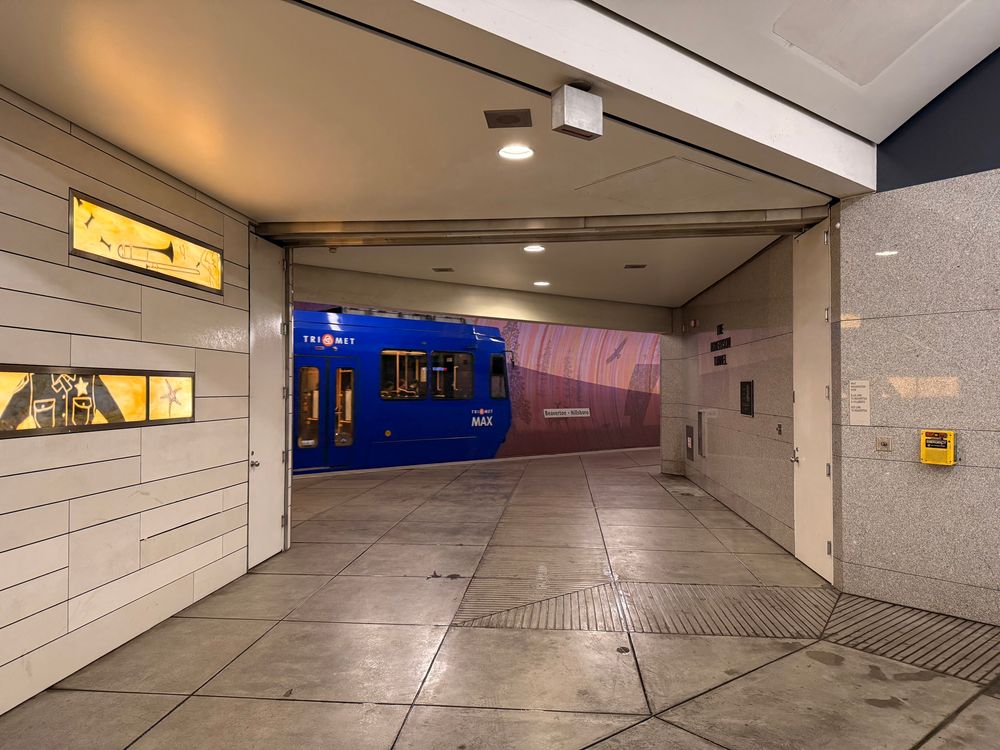 A train passing at an opposite platform. 