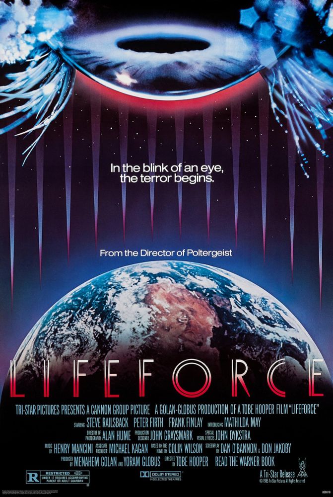 The great poster for LIFEFORCE with a huge eyeball looking down on the Earth “In the blink of an eye, the terror begins” 