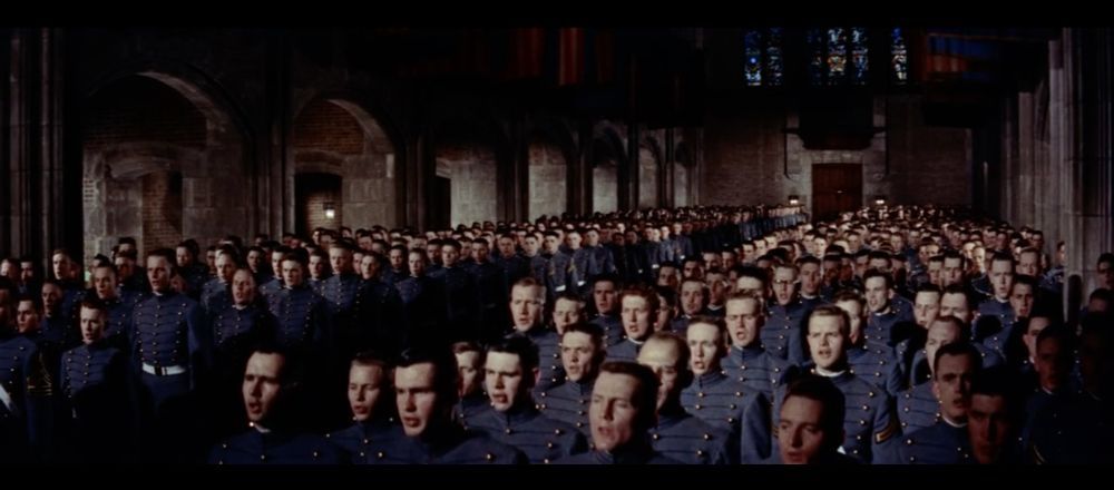 A shot in John Ford's THE LONG GRAY LINE (1955) showing rows and rows of West Point cadets in a cathedral. Ford innovated the then-new CinemaScope format to favor the Z-Axis (the depth of the image) as opposed to the height and width of a shot. 