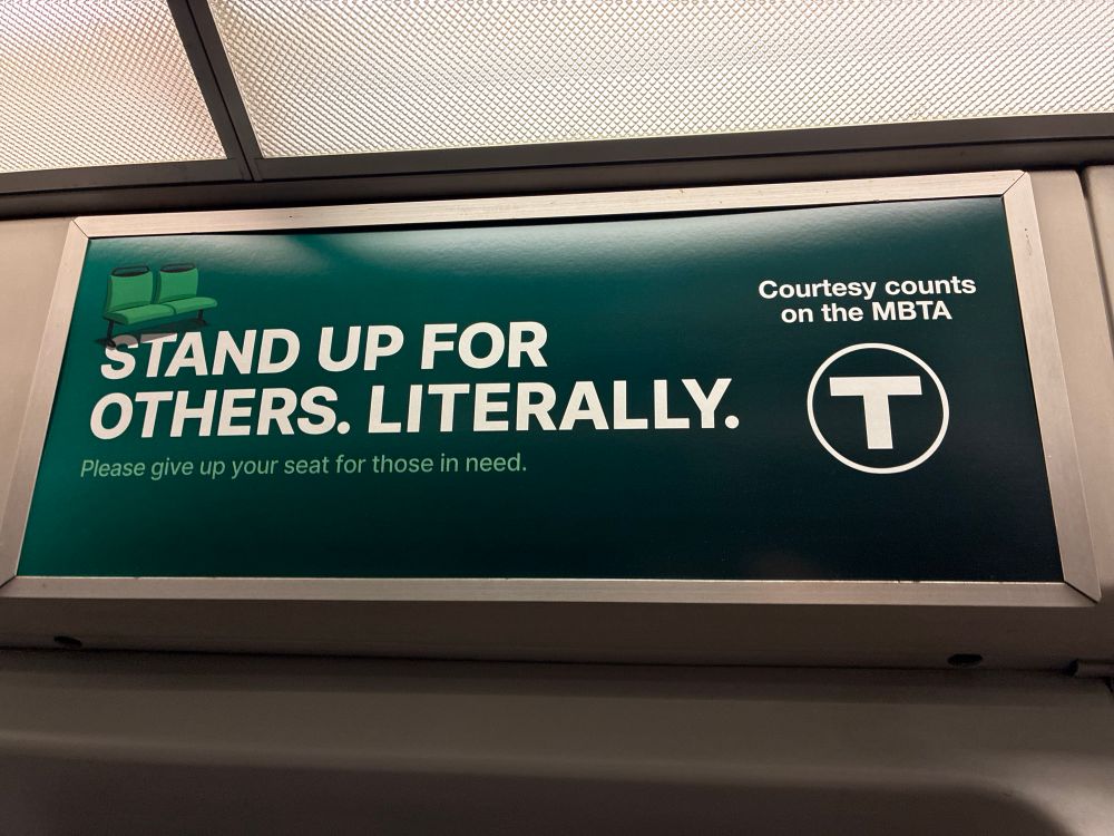 A green advertisement reads “Stand up for others. Literally.”