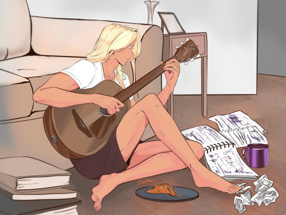 Klavier Gavin on the floor composing music