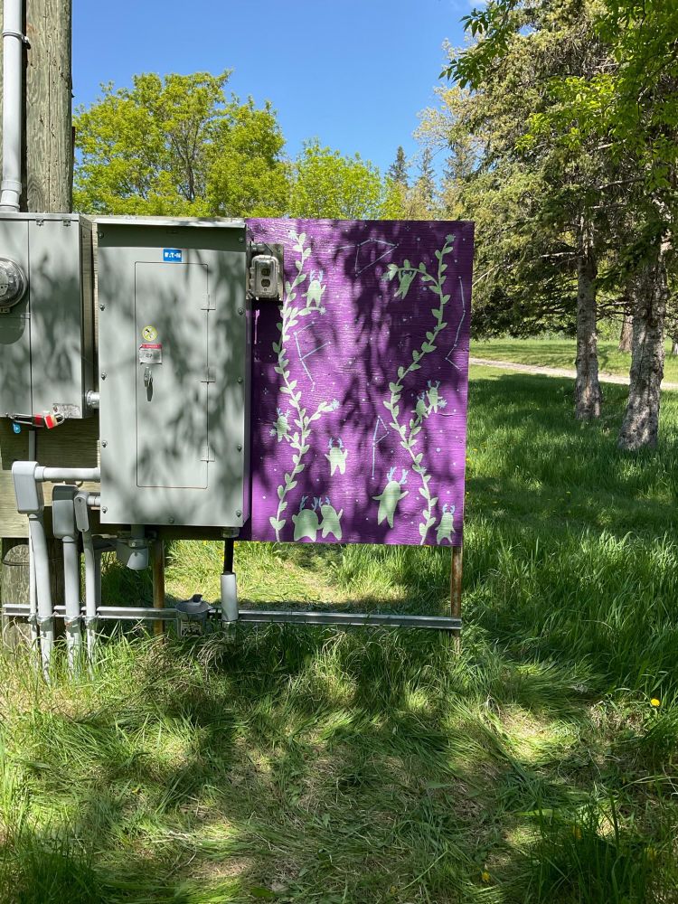 Photo of a mural of flowers and forest spirits 