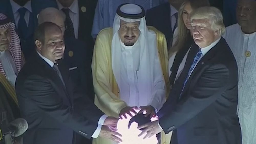 Creepy world leaders touching a glowing orb in a dark room.