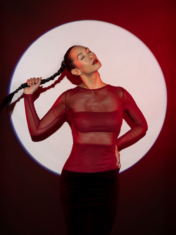 Fashion Model with Red Dress in Studio Lighting 