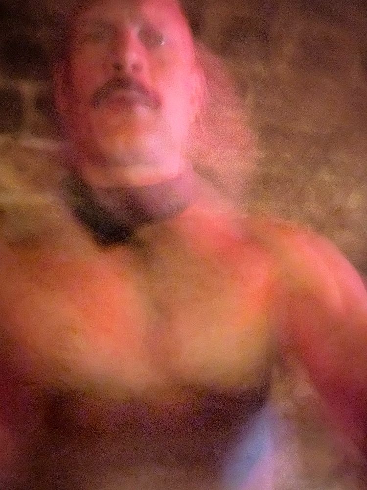 distorted photo of a shirtless man