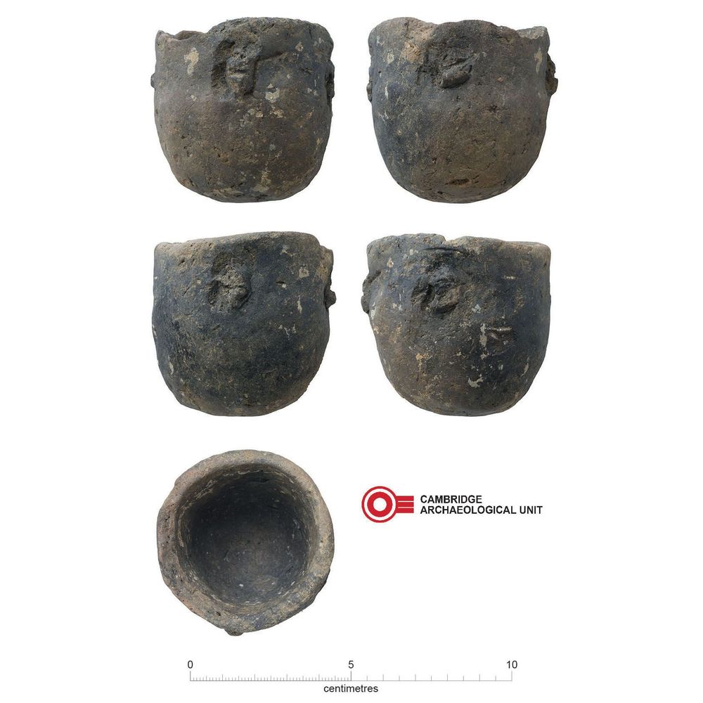 An image composed of five different views of a small black pot. The pot is roughly made with a rough outer surface with areas of raised bumpy texture. Its colour is a greyish black with occasional pale markings. 