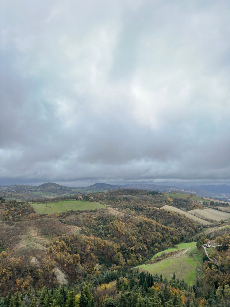 The hills outside of Bologna on a windy, cloudy day. 