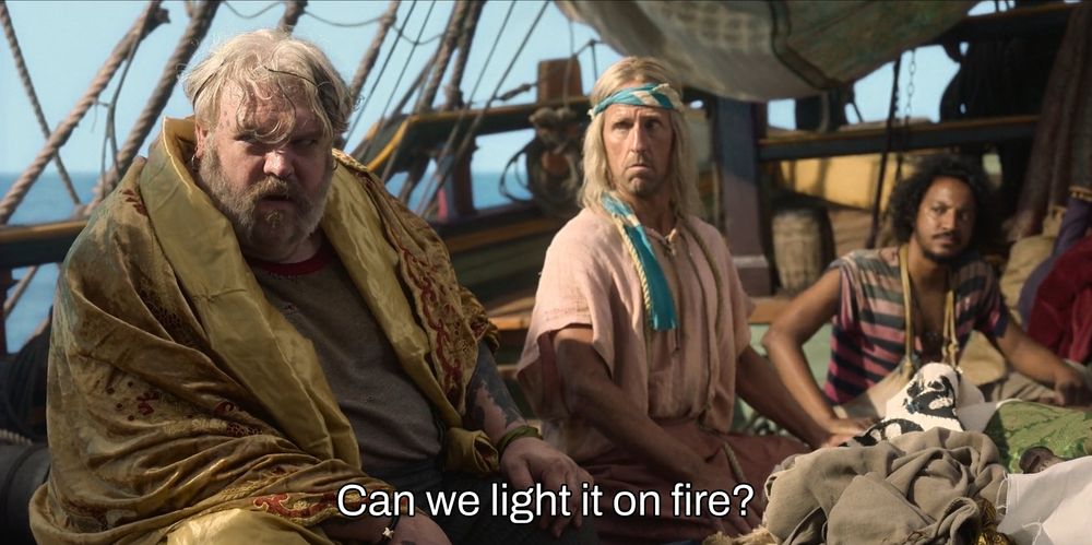 a screenshot from the ofmd pilot of wee john saying "can we light it on fire?"