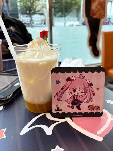 A banana flavored drink with a coaster of ironmouse