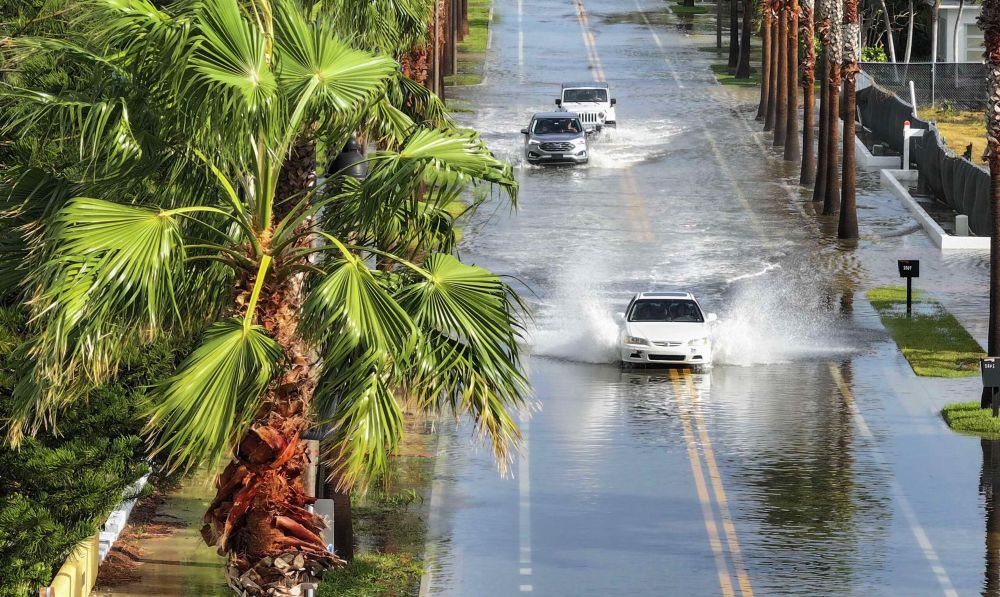 As Florida Floods, Insurance Industry Reaps What It Sowed Backing Fossil Fuels