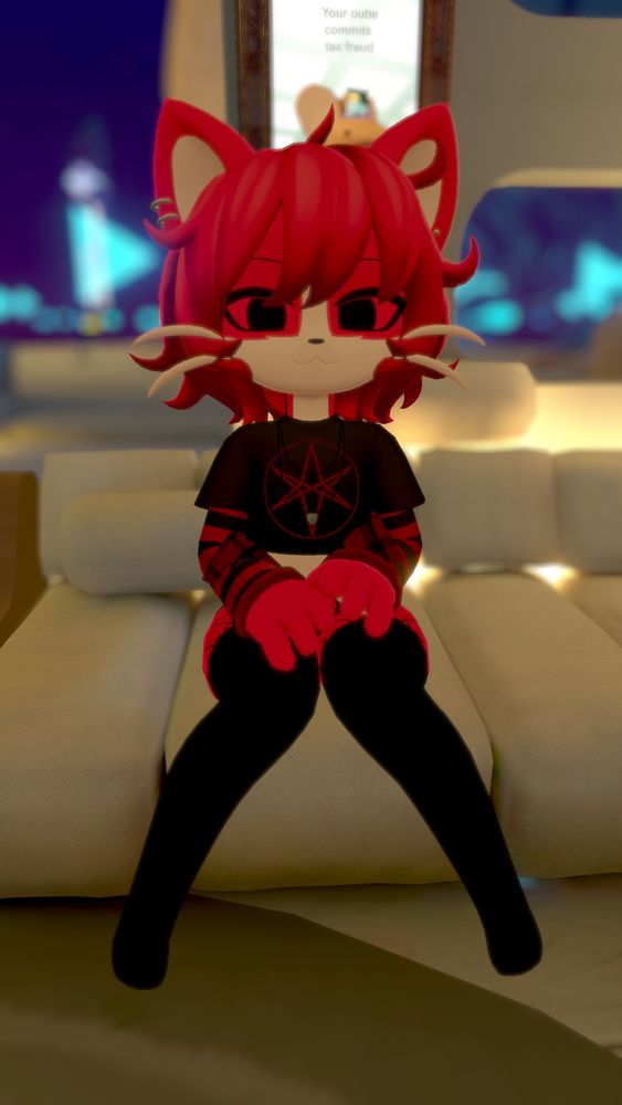 Chili sitting on couch