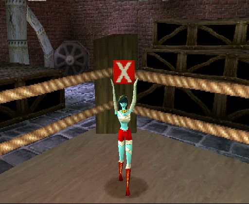 Kiya holding up the letter X in the Iron Slugger level in MediEvil 2.