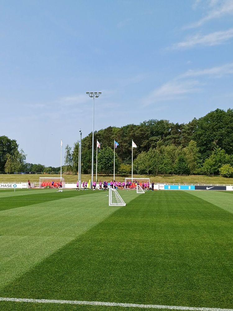 England players at St George's Park under blue skies