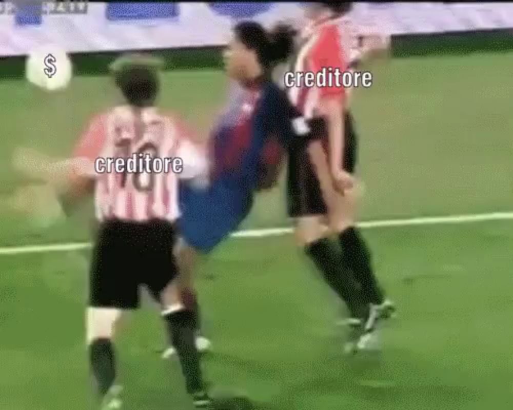 a group of soccer players are fighting on a field and one of them has the word creditore on his shirt