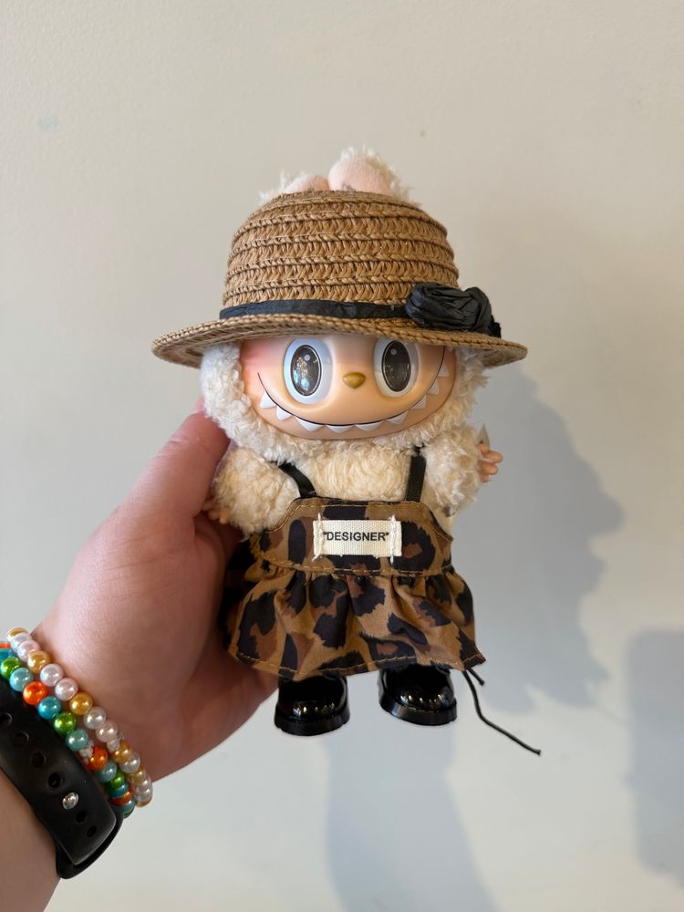 soy milk exciting macaron labubu in cheetah print dress, black boots, and a straw hat