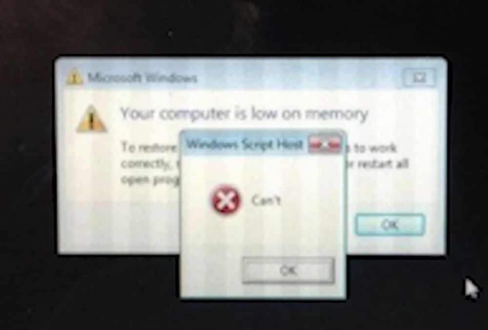 Windows Script Host is unable to can, presumably because of the system being low on memory as said in the background.