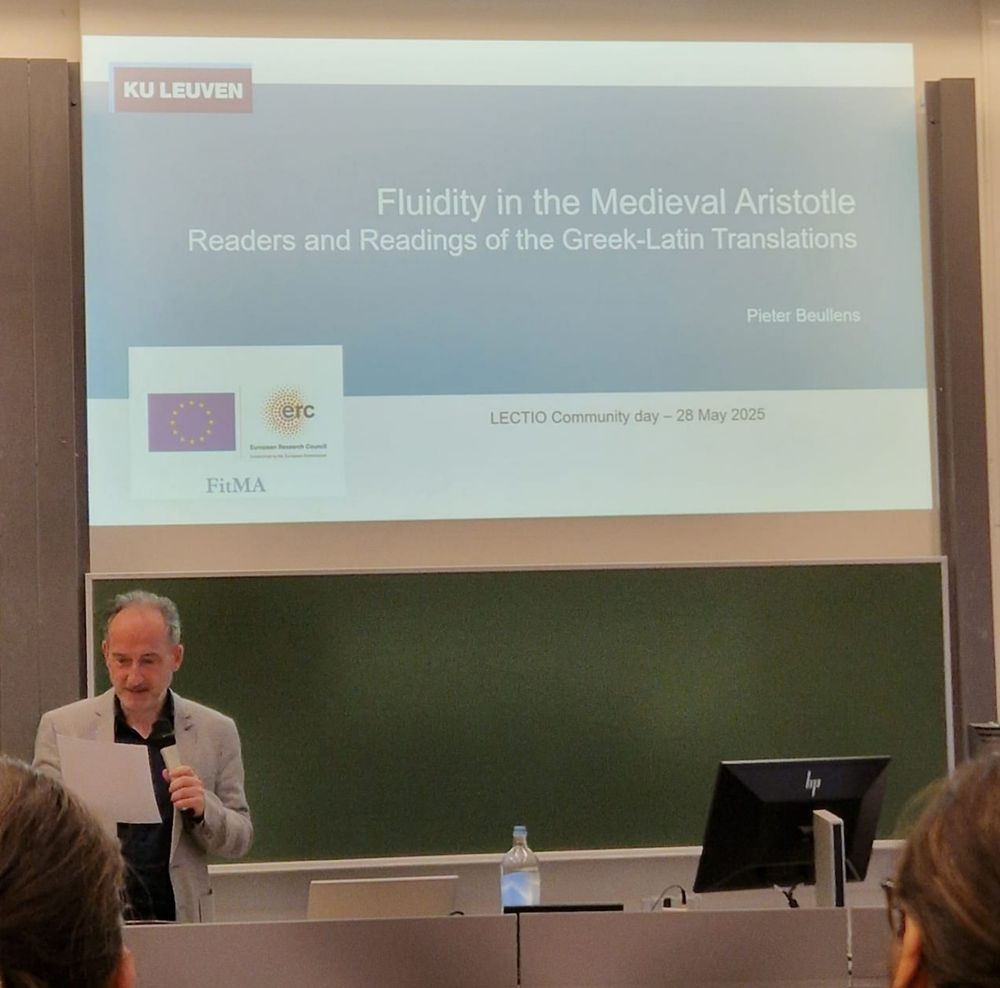 Pieter Beullens in front of the opening slide of his presentation on Fluidity in the Medieval Aristotle. 