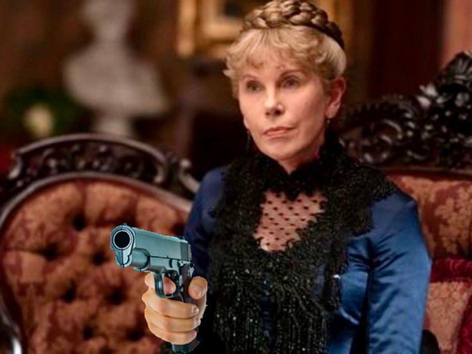 aunt anges from the gilded age holding a gun