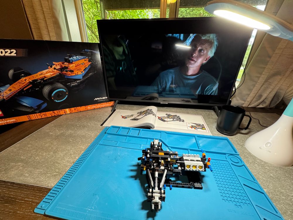 A McLaren formula 1 LEGO set in the process of being assembled