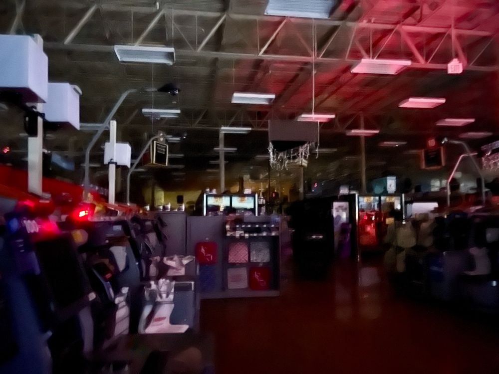 A bank of self-checkout machines sit idle as red light reflects on the ceiling at Fred Meyer in Issaquah, WA, on Nov. 19, 2024. 