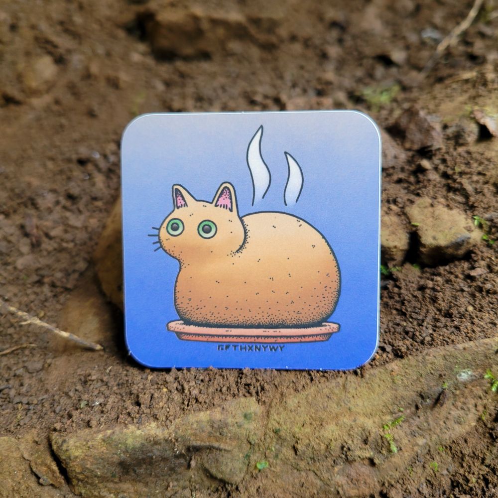 a cool sticker of a steaming loaf of fresh-baked cat