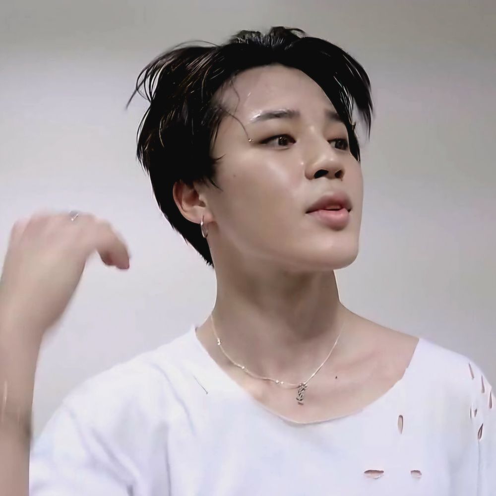 Same image but the aftermath of him brushing his hair back. He looks delectable. 
