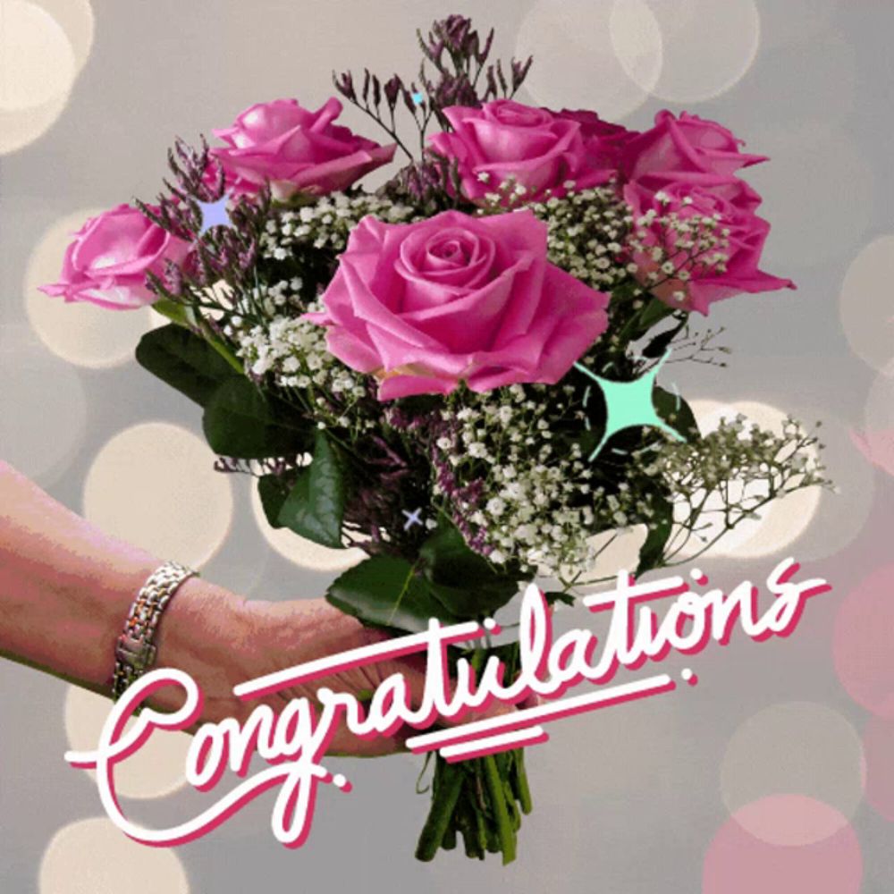 a person holding a bouquet of pink roses with the words congratulations above it