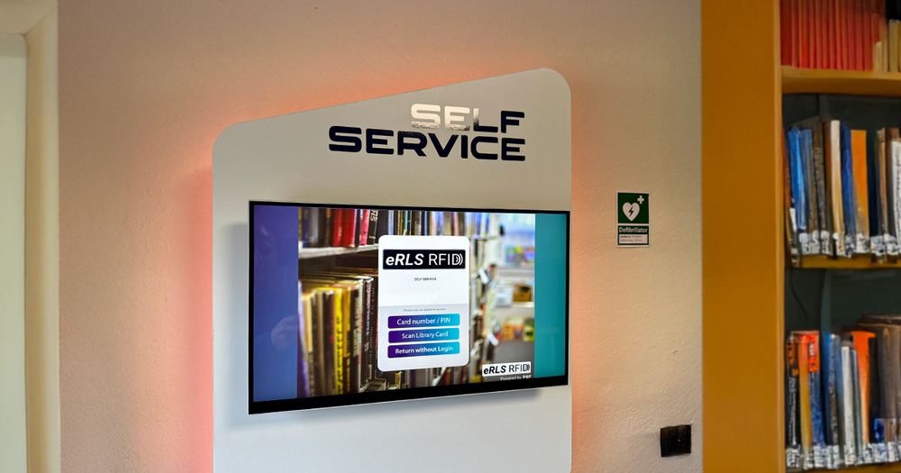 eRLS Edge wall-mounted self-service unit in a library