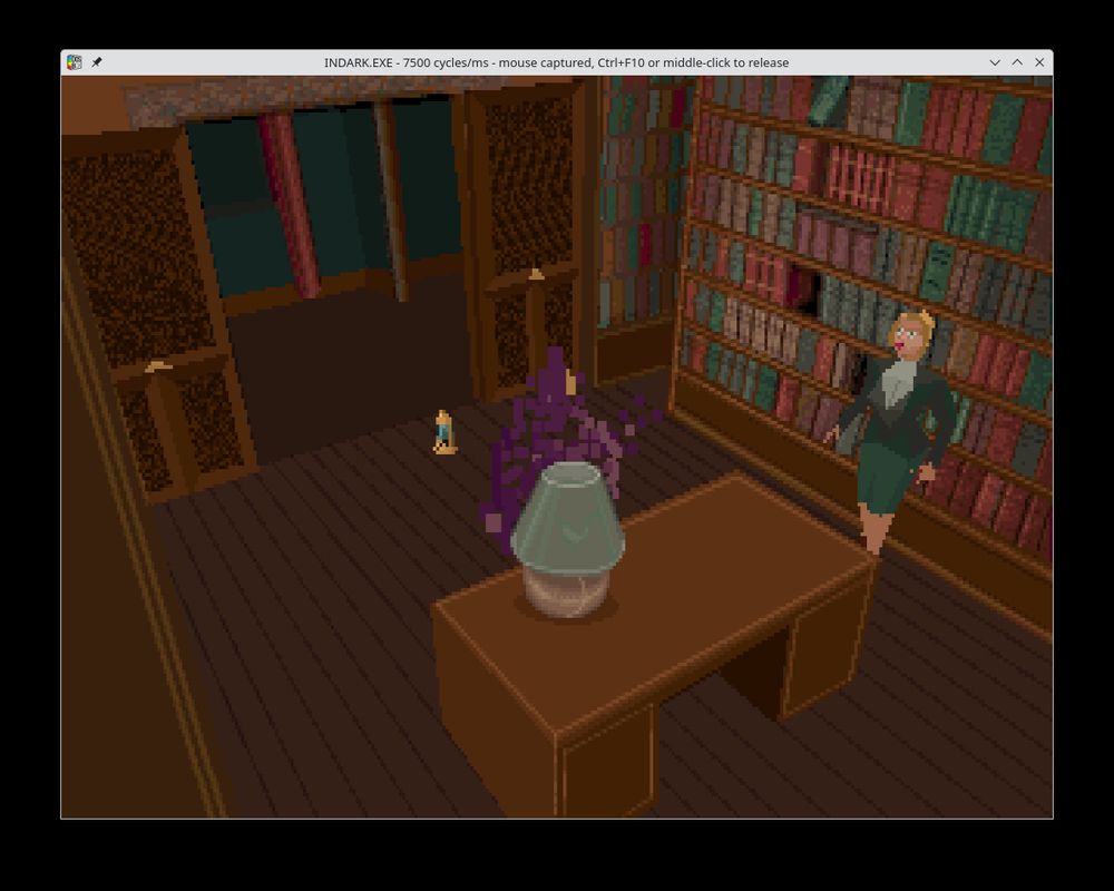 Screenshot d'une fenêtre de Dosbox faisant tourner Alone In The Dark (le premier jeu de la série sorti en 1992), je joue Emilie Hartwood et je me trouve dans la bibliothèque et le Vagabond est à moins d'un mètre de moi pour m'attraper