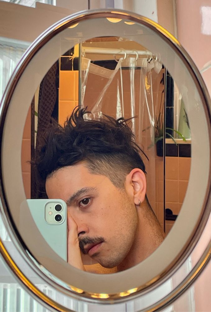 Selfie in bathroom mirror - sides cleaned-up by me. A skill developed during the times of lockdown.