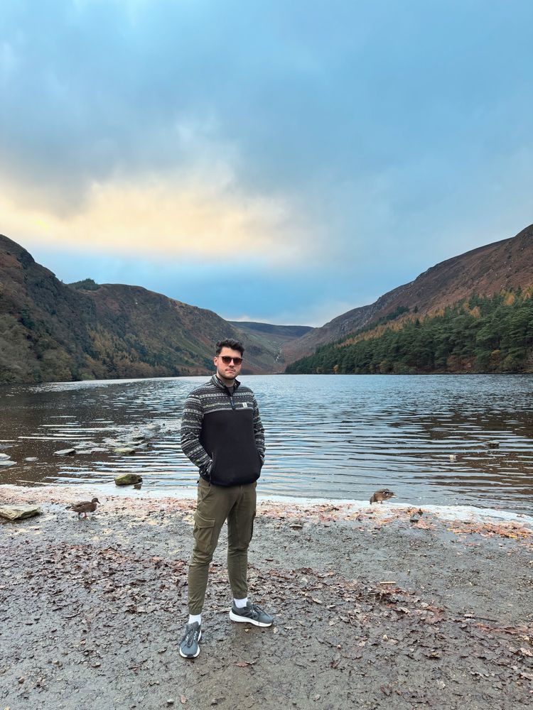 Handsome man in front of lake