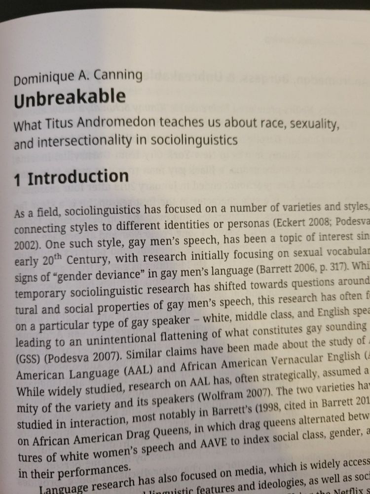 Photo of black text on white paper showing a chapter of a book: author name "dominique a. canning"
chapter title "unbreakable: what Titus andromedon teaches us about race, sexuality, and intersectionality in sociolinguistics"