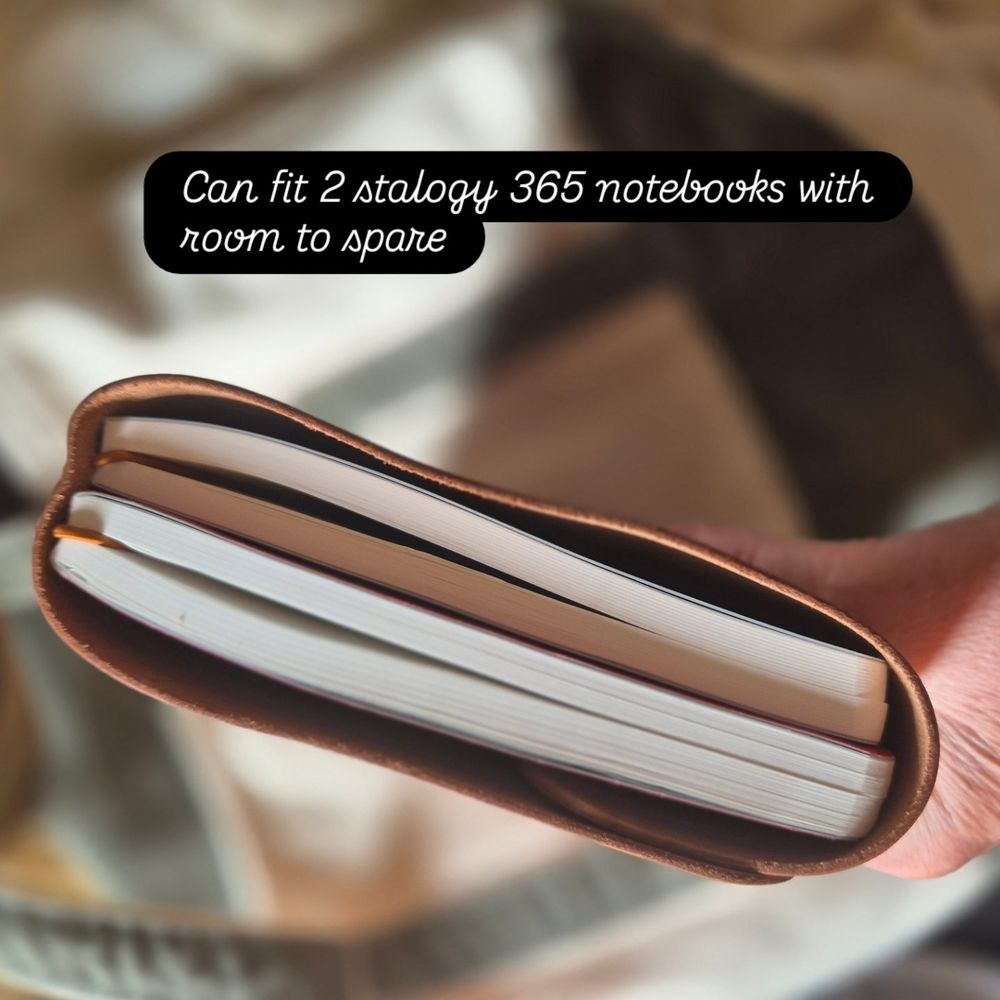 Side view of leather cover showing it holds 2 thick Stalogy 365 notebooks easily