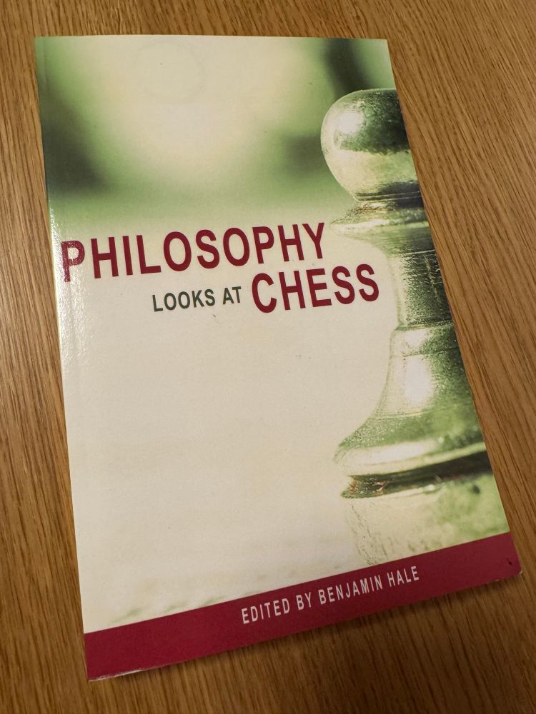 Book: Philosophy Looks At Chess, edited by Benjamin Hale. 