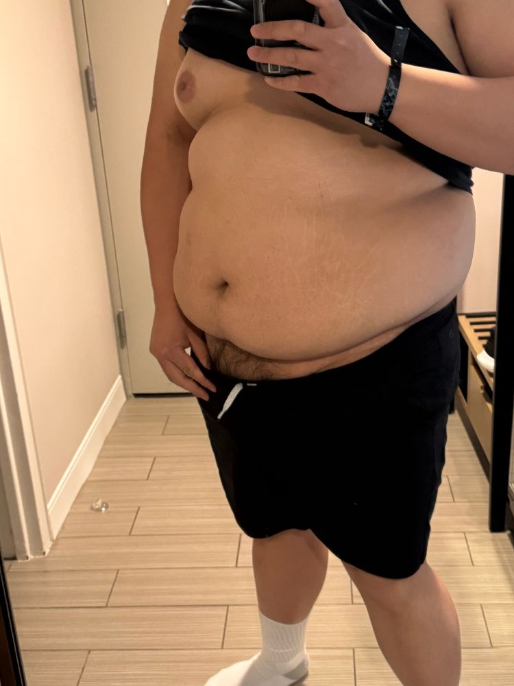 Here is another picture of me showing my belly and also showing my bush