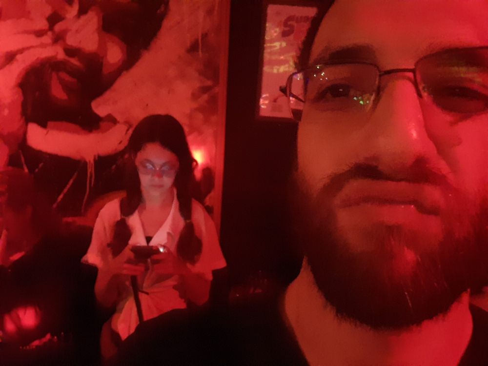 Foto minha e dela na fonte, ela não sabe que tirei a foto