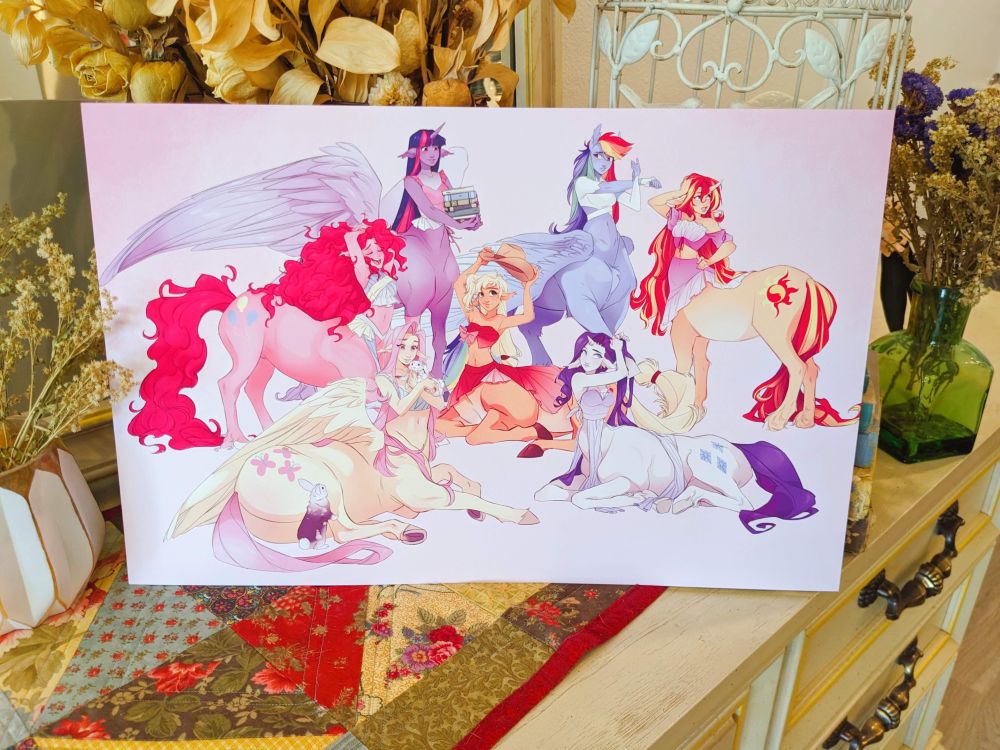 A photo of an 11x17 print featuring the Mane Six of My Little Pony: Friendship is Magic - as centaurs